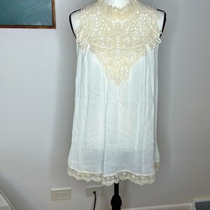 Stunning, sheer tunic with lace detail, size large
